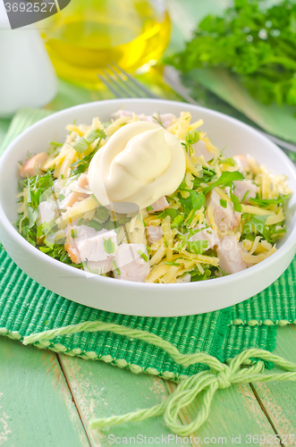 Image of salad with chicken and cheese