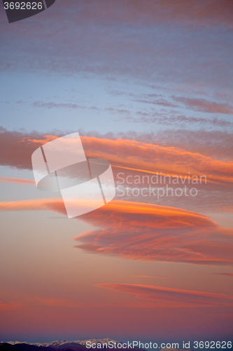 Image of sunrise in the colored sky snow  background
