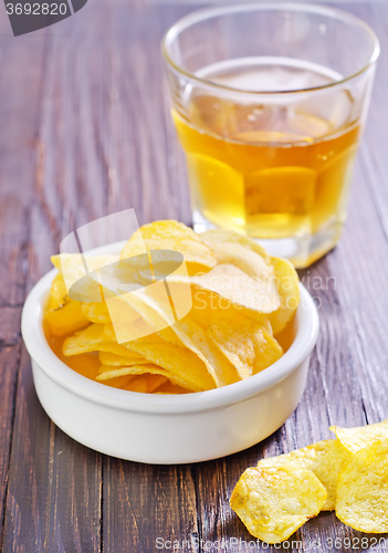 Image of chips from potato with beer