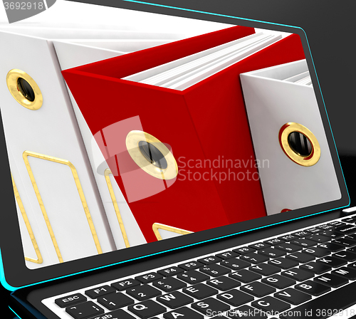 Image of Red File On Laptop Showing Organized Documents