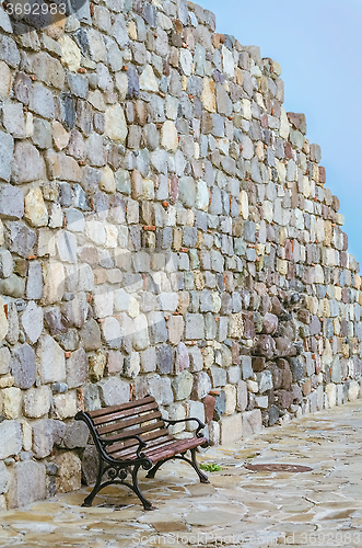 Image of Bench near the Wall