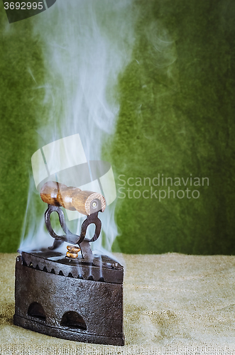 Image of Steaming Hot Iron