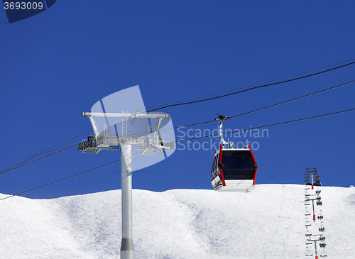 Image of Gondola and chair-lifts at ski resort in nice day