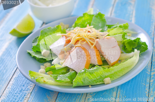 Image of fresh salad with chicken and cheese