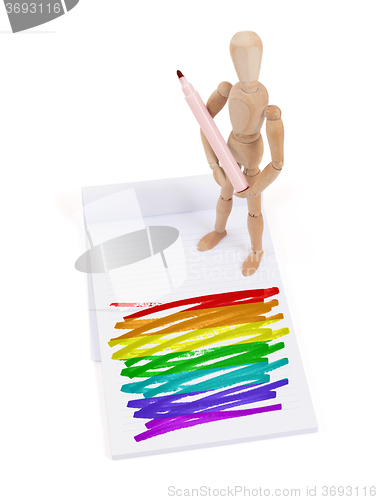 Image of Wooden mannequin made a drawing - Rainbow flag