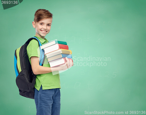 Image of happy student boy with school bag and books