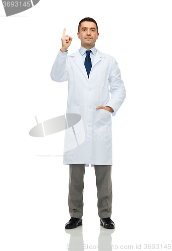 Image of male doctor in white coat pointing finger up