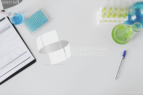 Image of close up of scientific laboratory table with stuff