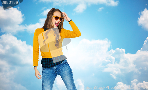 Image of happy young woman or teen girl in casual clothes