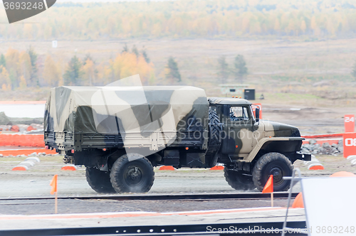 Image of Curtain sided truck comes through on high obstacle