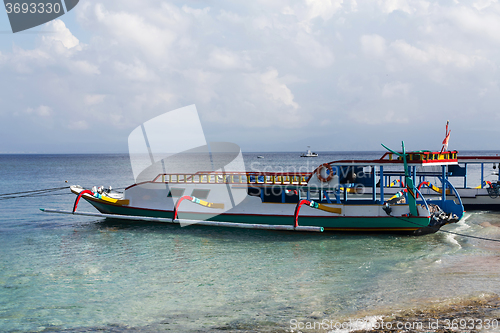 Image of dream beach with boat, Bali Indonesia, Nusa Penida island