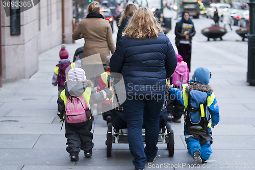 Image of Female with Pram