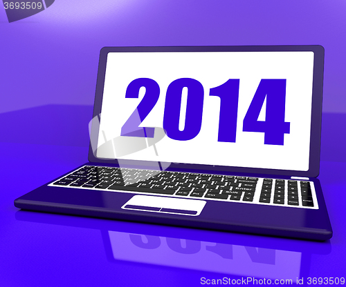 Image of Two Thousand And Fourteen On Laptop Shows Year 2014