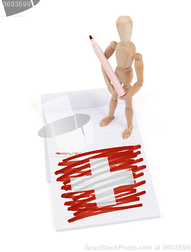 Image of Wooden mannequin made a drawing - Switzerland