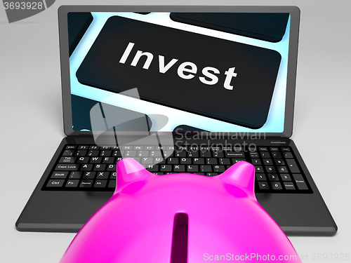 Image of Invest Key On Laptop Showing Investment Market