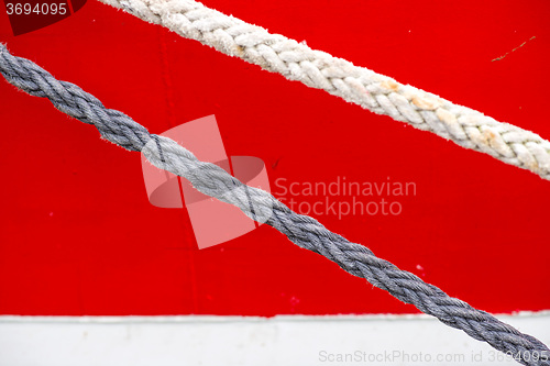 Image of ship hull with mooring line