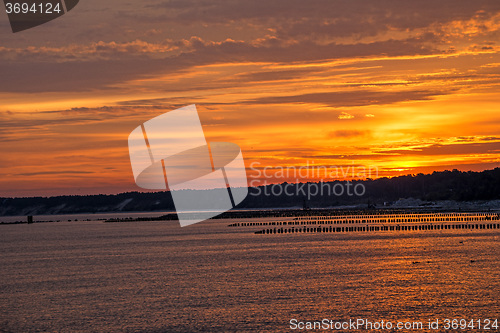 Image of Sunrise over the Baltic Sea with groynes