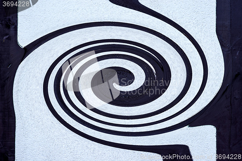 Image of black spiral in a frame