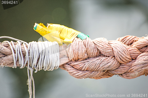 Image of mooring line of a trawler with cracks
