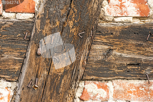 Image of brick wall of an old frame house