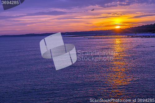 Image of Sunrise over the Baltic Sea with groynes