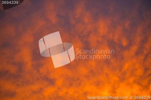 Image of sky with red clouds during sunrise