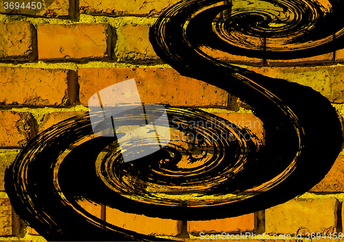 Image of black spiral on brick wall