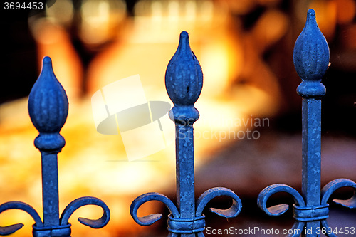 Image of fence with green background