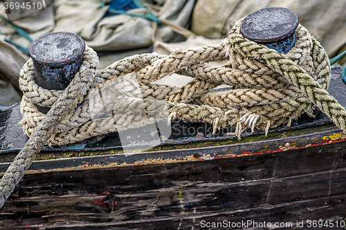 Image of Cleat with mooring line of a trawler