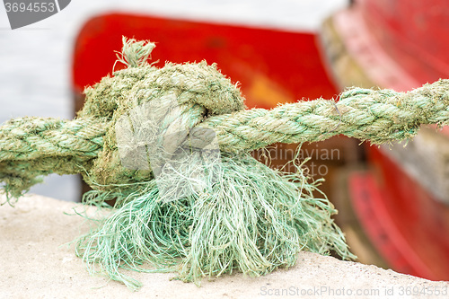 Image of mooring line of a trawler with knot