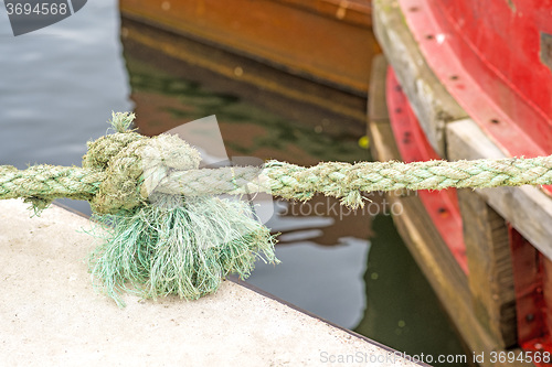 Image of mooring line of a trawler with knot