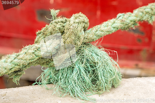 Image of mooring line of a trawler with knot
