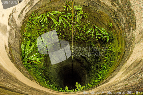 Image of old, deep, medieval well of a castle