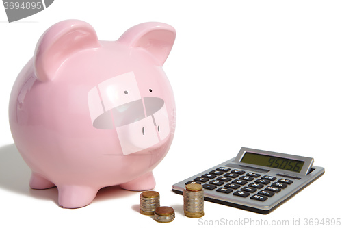 Image of Pig bank and calculator