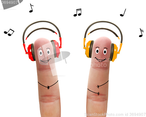 Image of Happy fingers in headphones