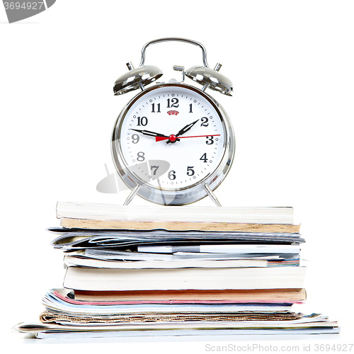 Image of Alarm-clock and documents