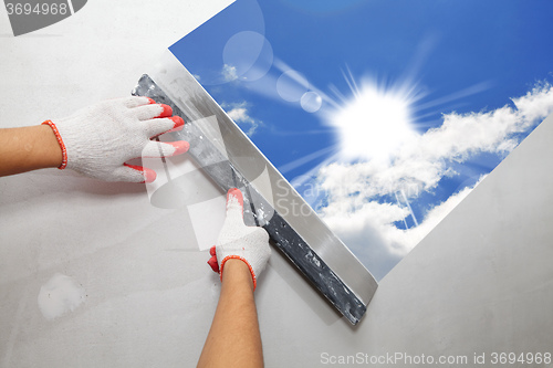 Image of Contractor Plasterer.  Sun and sky