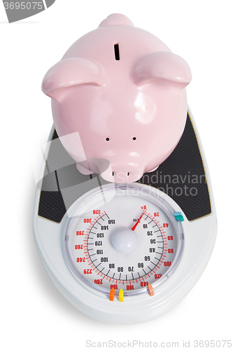 Image of Pig bank and scales
