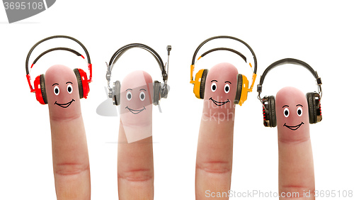 Image of Happy fingers in headphones