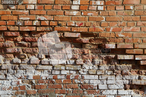 Image of The ancient dirty brick wal