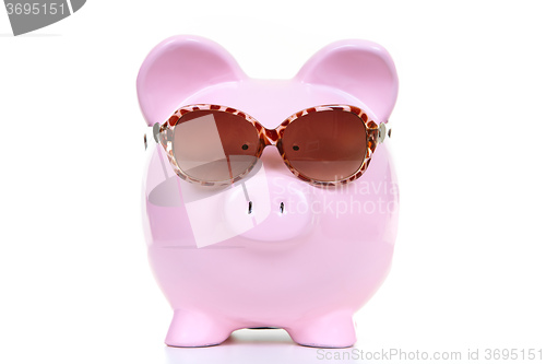 Image of Money-box and sun glasses