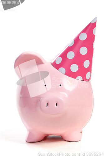 Image of The pink  pig in a cap