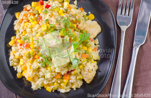 Image of rice with meat and vegetables