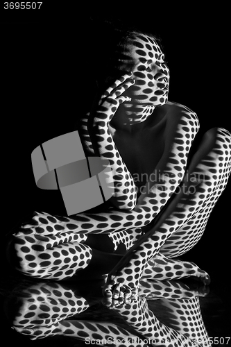 Image of The  body of woman with black and white pattern