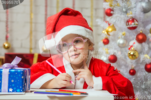 Image of Girl wondering drawing card for Christmas