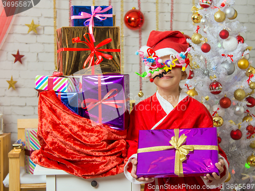 Image of Girl with fireworks rolling in from the eyes rejoices bestowed gifts