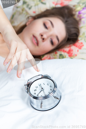 Image of The young girl in bed