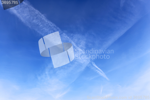 Image of Aircraft crossed tracks in a blue sky