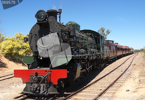 Image of steam train crossing lines