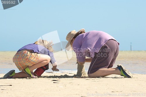 Image of kids building sandcastles series no 1